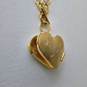 RELICARIO DE CORAZÓN DORADO